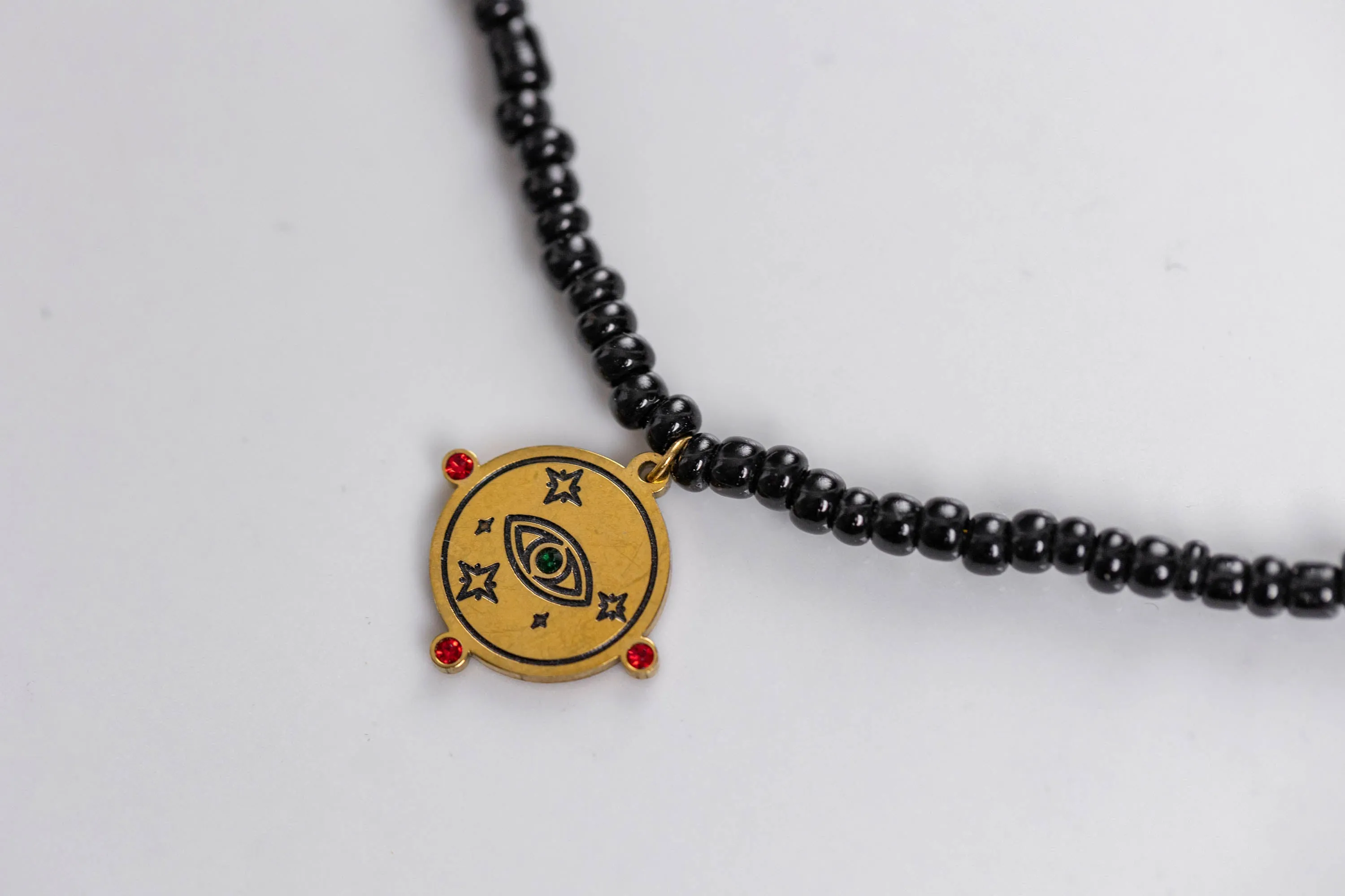 Black necklace with evil eye