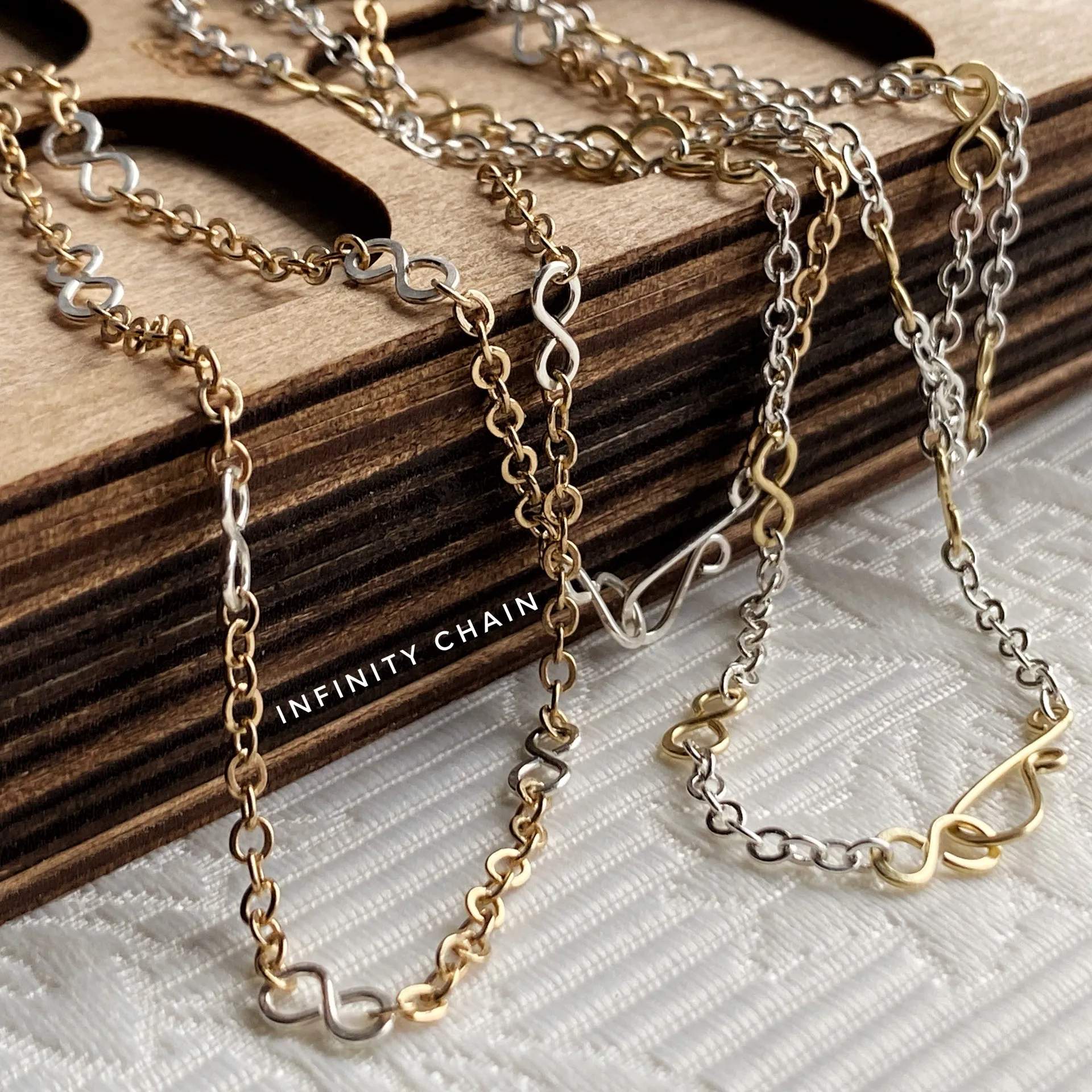 Infinity.  (silver links, gold chain)  The Celestial Collection