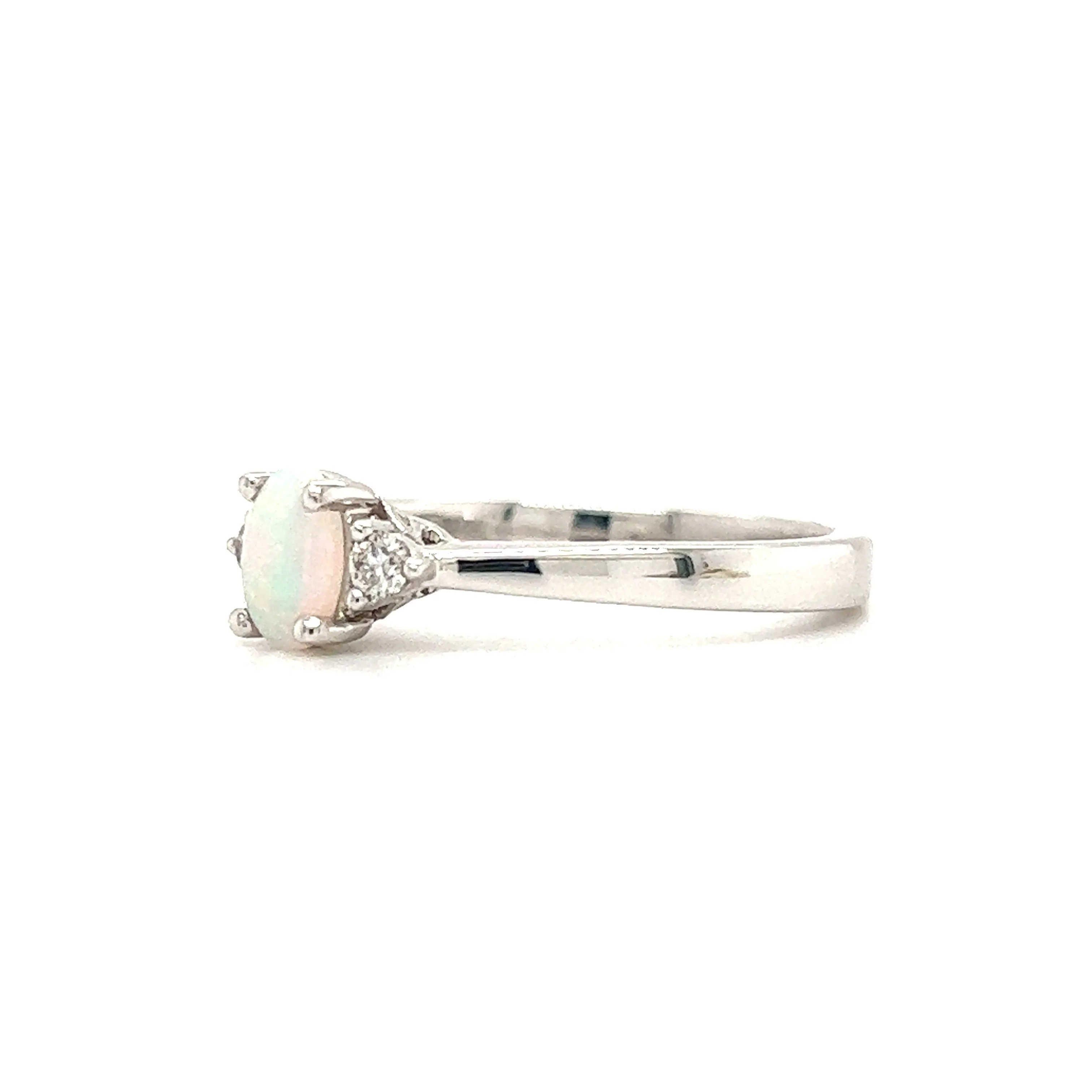 Oval Opal Ring with Two Side Diamonds in 14K White Gold