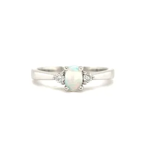 Oval Opal Ring with Two Side Diamonds in 14K White Gold